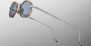 Jacques Marie Mage Varda Cairo ovale Luxus-Sonnebrille mit silbernem Rahmen und blauen Gläsern
