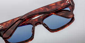 Jacques Marie Mage Cleavon 57 | Breccia Luxussonnebrille mit braunem Rahmen und blauen Gläsern