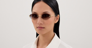 Cartier CT0592S 001 Rahmenlose Luxus-Sonnebrille in Gold mit grauen Gläsern