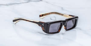 Jacques Marie Mage Rimbaud Beau - Eckige Luxussonnenbrille mit braunem Rahmen und lila Gläsern