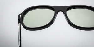 Jacques Marie Mage Richard Cobra Luxussonnenbrille mit schwarzem Rahmen und grünen Gläsern