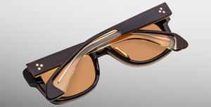 jacques marie mage fly london eckige sonnenbrille in braun mit orangenen gläsern