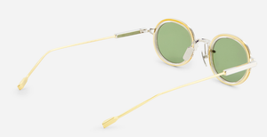 Sato Acamar II P/YG-1 ovale sonnenbrille aus titan in gold und platinum mit grünen gläsern
