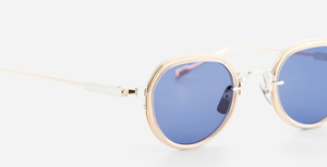 sato Belell II P/RG-1 panfoförmige sonnenbrille aus titan in silbe rund gold mit blauen gläsern