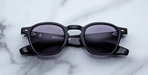 jacques marie mage zephirin47 hudson eckige sonnenbrille in schwarz mit violetten gläsern