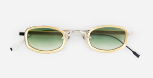 sato aquila p/yg-1 eckige sonnenbrille aus titan in platinum und gelbgold mit grünen verlaufsgläsern