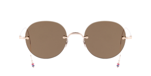 thom browne 938a 711 randlose Titansonnenbrille in gold mit braunen Gläsern