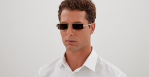 model wearing cartier 0473S 001 gold