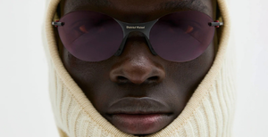 district vision mami vantage t black ovale randlose sportsonnenbrille in schwarz mit dunklen rose gläsern