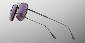 jacques marie mage cendrars corbeau sonnenbrille aus titan in schwarz mit grauen gläsern