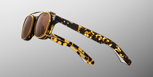 jacques marie mage clip on zephirin 47 gold eckiger sonnenclip aus titan in gold mit braunen gläsern, hergestellt in japan