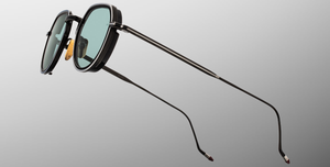 jacques marie mage dixon paon pantoförmige sonnenbrille aus titan und acetat in schwarz und silber mit türkisenen Gläsern