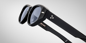 jacques marie mage krasner black ovale sonnenbrille in schwarz mit grauen gläsern