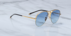 jacques marie mage amelia gold, pilotensonnenbrille in gold mit blauen verlaufsgläsern