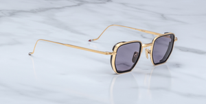 jacques marie mage atkins gold eckige sonnenbrille in gold und schwarz mit violetten gläsern