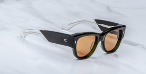 jacques marie mage chelsea borneo eckige sonnenbrille in grün mit orangenen gläsern
