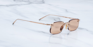 jacques marie mage fonda sweetheart eckige randlose sonnenbrille aus titan in rosegold und orangenen gläsern