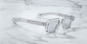 jacques marie mage sandro sulfur eckige sonnenbrille in transparent mit grauen gläsern