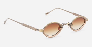sato talita ag/mb-1 ovale sonnenbrille aus titan in gold und braun mit braunen verlaufsgläsern