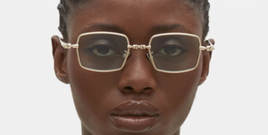 kuboraum H69 LG eckige Titansonnenbrille in gold mit hellgrpnen gläsern