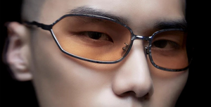 Kuboraum H30 | BM curved Sonnenbrille mit schwarzem Rahmen und gelben Gläsern