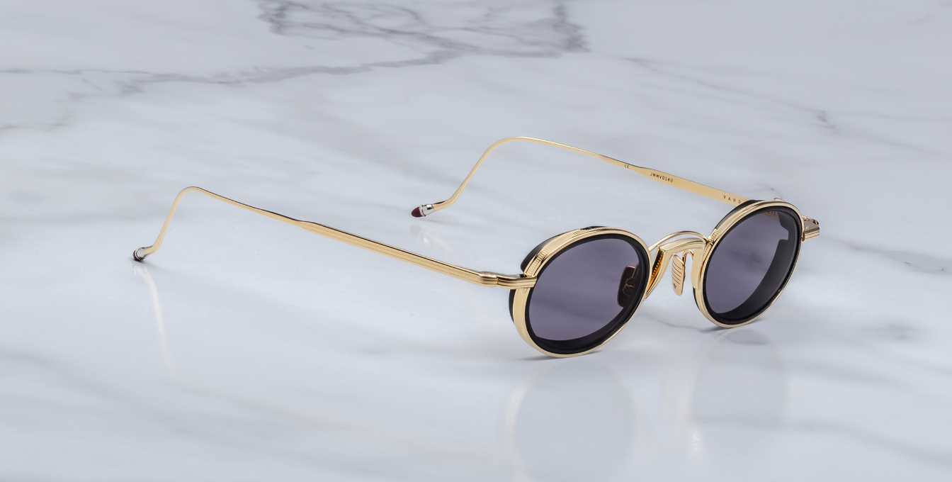 Jacques Marie Mage Varda | Ebony ovale Luxus-Sonnenbrille mit goldenem Rahmen und lila Gläsern