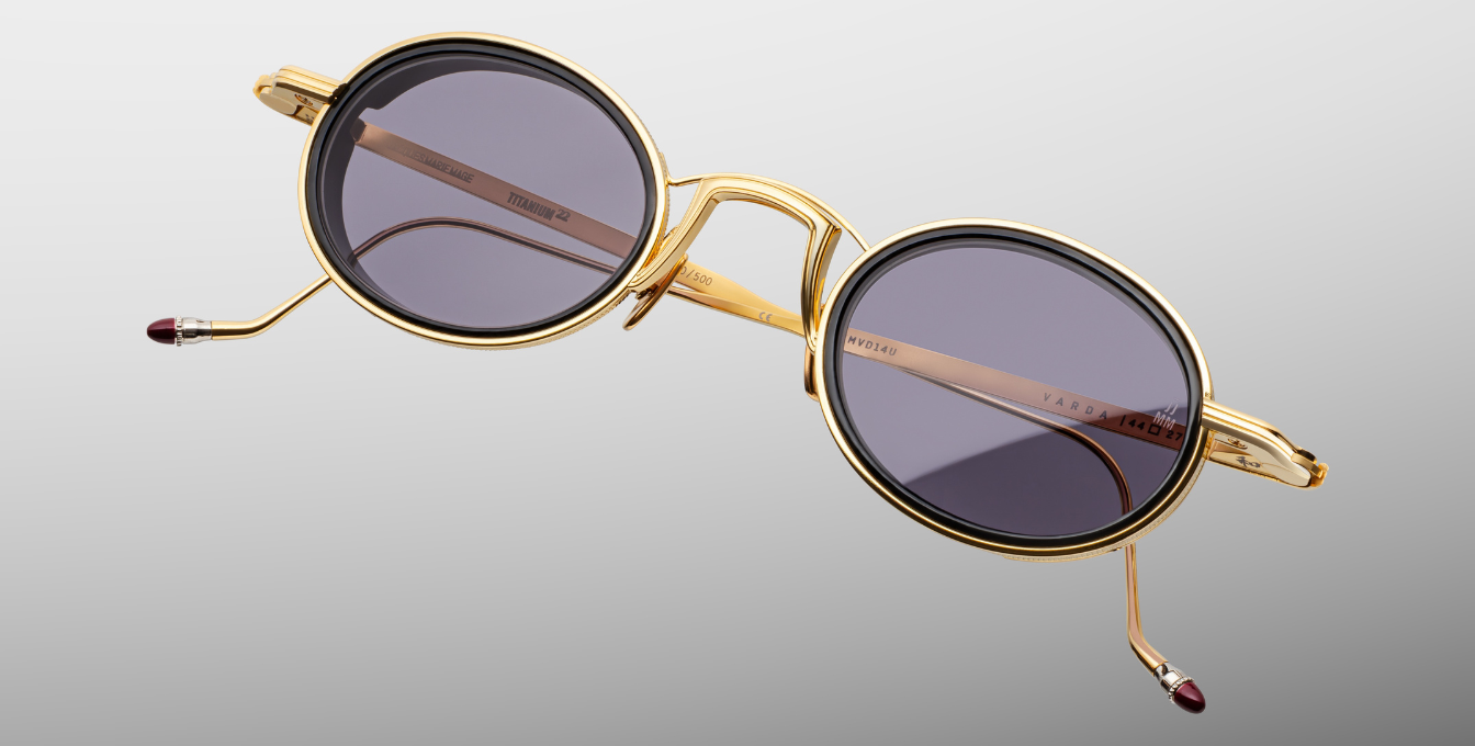 Jacques Marie Mage Varda | Ebony ovale Luxus-Sonnenbrille mit goldenem Rahmen und lila Gläsern