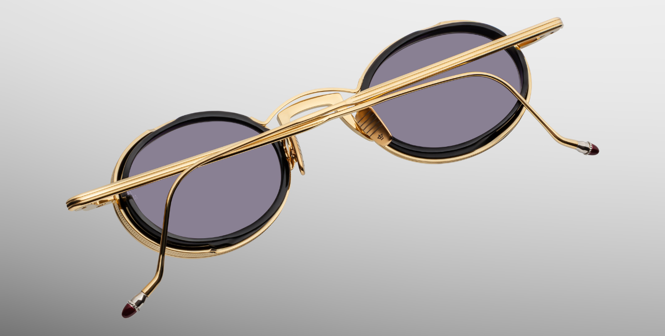 Jacques Marie Mage Varda | Ebony ovale Luxus-Sonnenbrille mit goldenem Rahmen und lila Gläsern