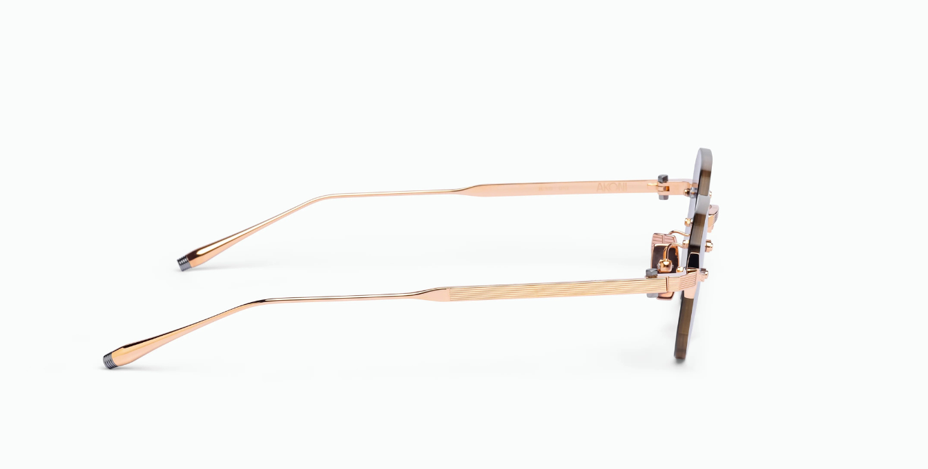 Akoni Juno - One Gold - Luxus-Sonnebrille aus Japan in Gold mit blau gelben Gläsern