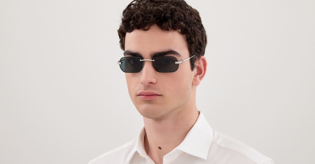 Cartier CT0577S 002 Rahmenlose Luxus-Sonnebrille in Silber mit grünen Gläsern
