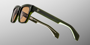 Jacques Marie Mage Torino Borneo - Luxussonnenbrille, handgemacht in Japan mit grünem Bügel und orangenen Gläsern
