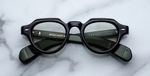 Jacques Marie Mage Kellerman Cobra runde Luxussonnenbrille mit schwarzem Rahmen