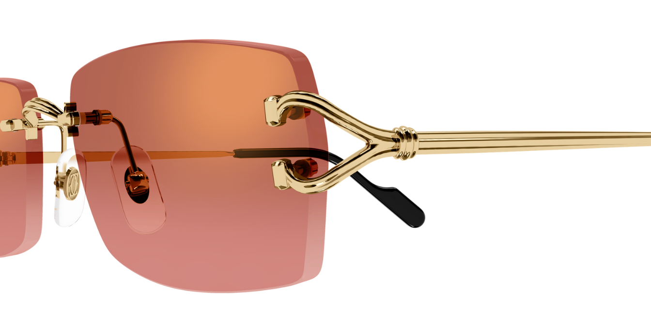 Cartier CT0550S | 005 Luxussonnenbrille in Gold mit roten Gläsern