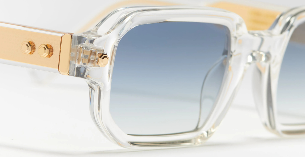 John Dalia P16 | C190 (47) - Luxussonnenbrille mit transparentem Rahmen und blauen Gläsern in Eckig.