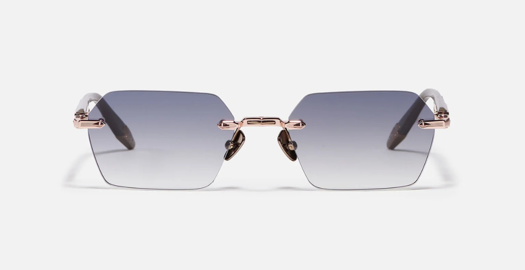 John Dalia R03 | C440 - Luxussonnenbrille mit Roségold Rahmen und grauen Gläsern.