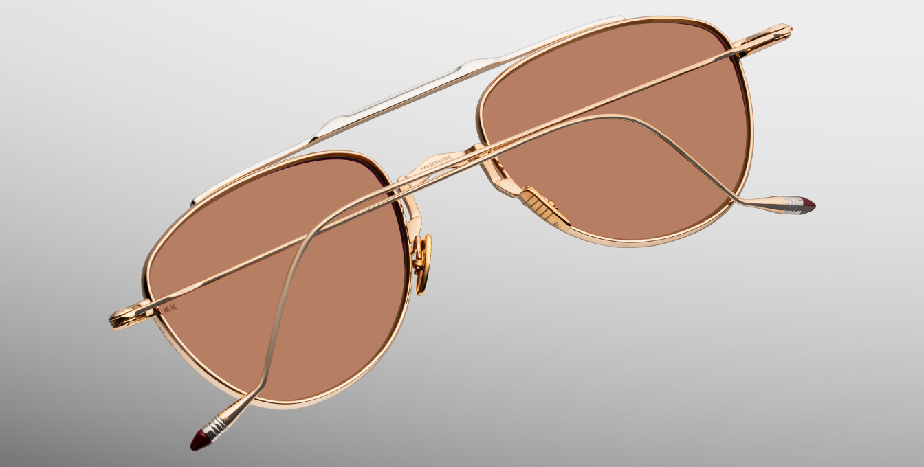 jacques marie mage flynn darjeeling aviator sonnenbrille aus titan in gold mit orangenen gläsern