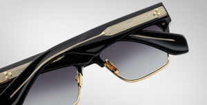 jacques marie mage bugsy ecplise2 cateye sonnenbrille in schwarz und gold mit dunkel grauen verlaufsgläsern