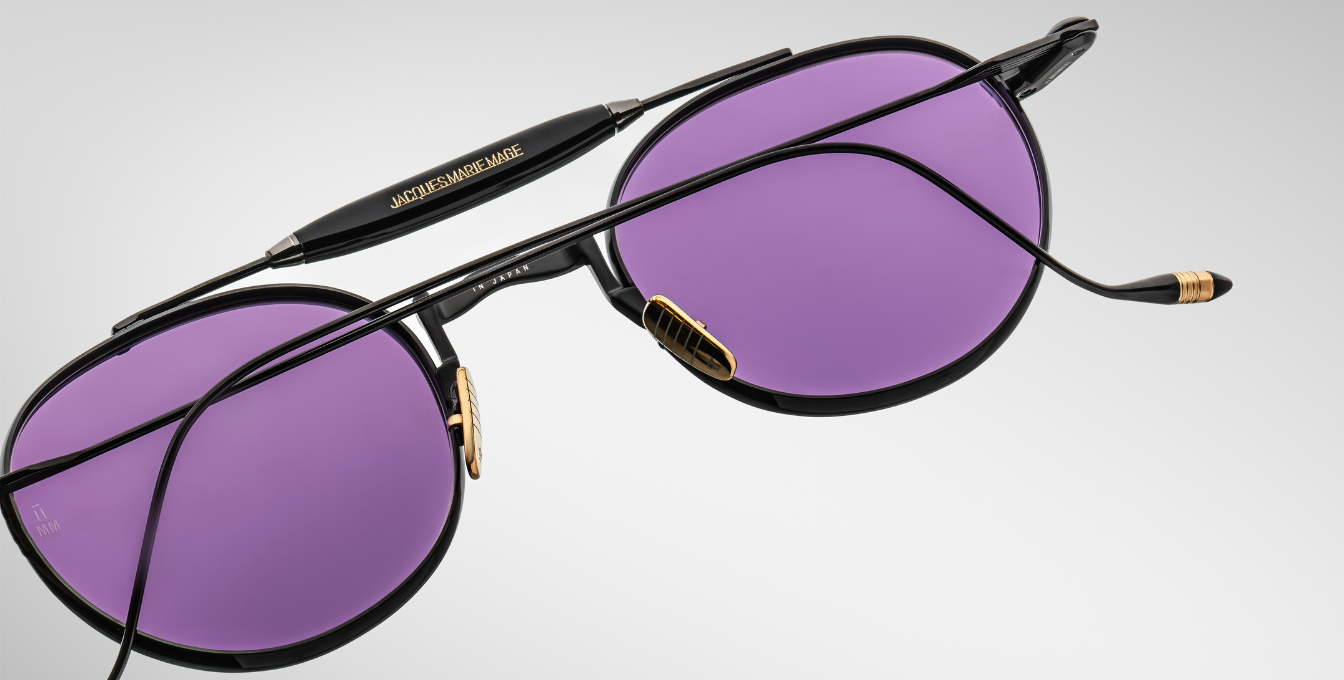 jacques marie mage dasan spider ovale sonnenbrille in schwarz mit violetten gläsern
