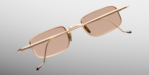 jacques marie mage dusk sweetheart eckige sonnenbrille aus titan in rosegold mit orangenen gläsern