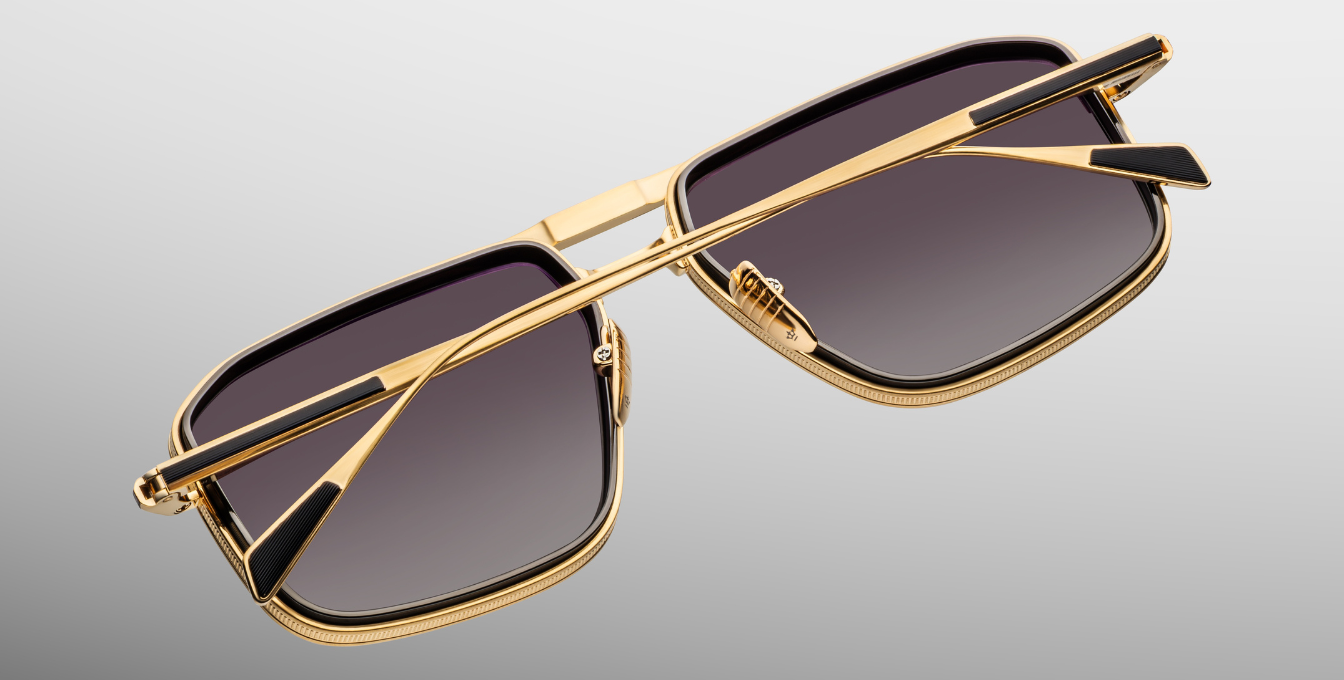 jacques marie mage earl cia eckige sonnenbrille in gold und schwarz mit schwarzen gläsern