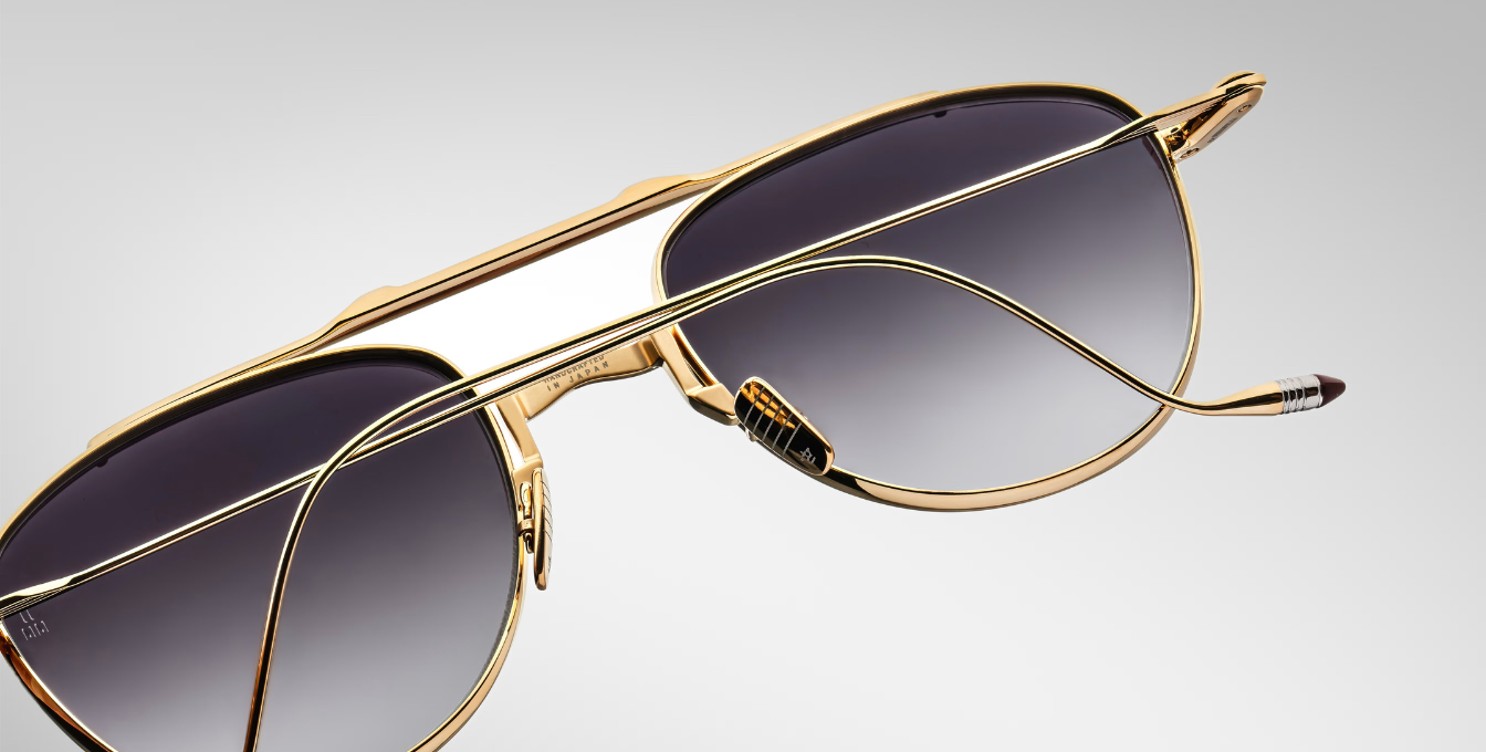 jacques marie mage flynn cia aviator sonnenbrille aus titan in gold mit grauen verlaufsgläsern