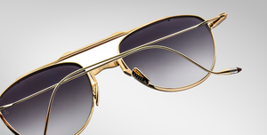 jacques marie mage flynn cia aviator sonnenbrille aus titan in gold mit grauen verlaufsgläsern