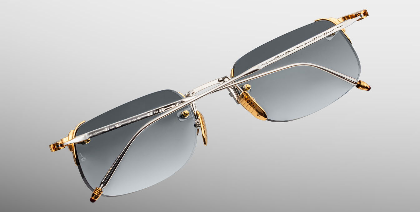 jacques marie mage fonda electrum eckige randlose sonnenbrille aus titan in silber und gold mit grünen verlaufsgläser