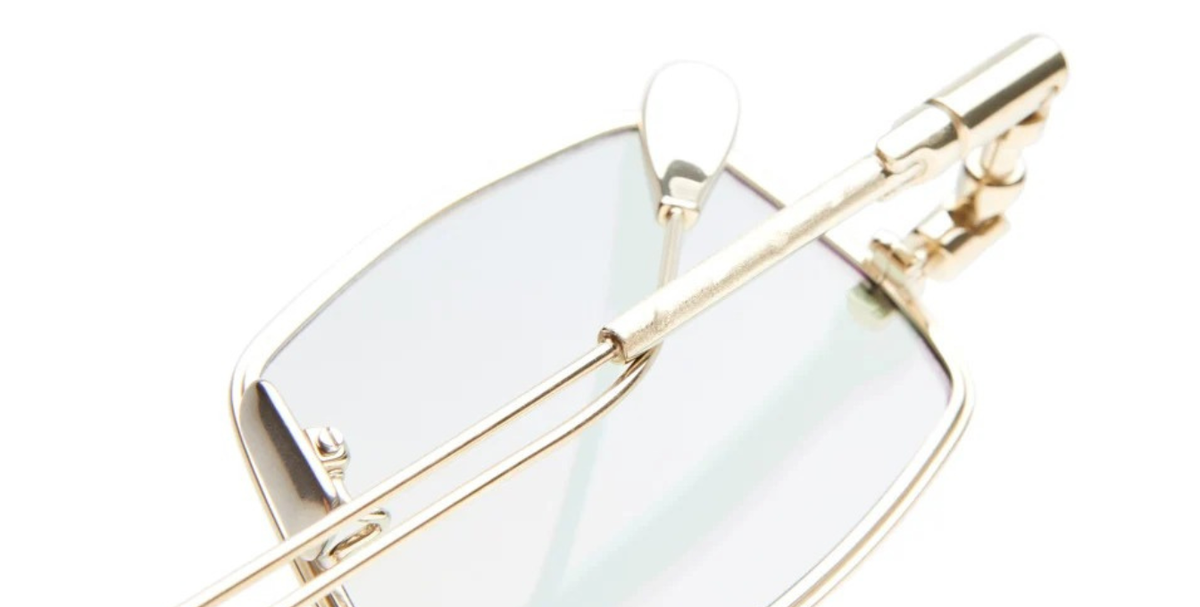 kuboraum H69 LG eckige Titansonnenbrille in gold mit hellgrpnen gläsern