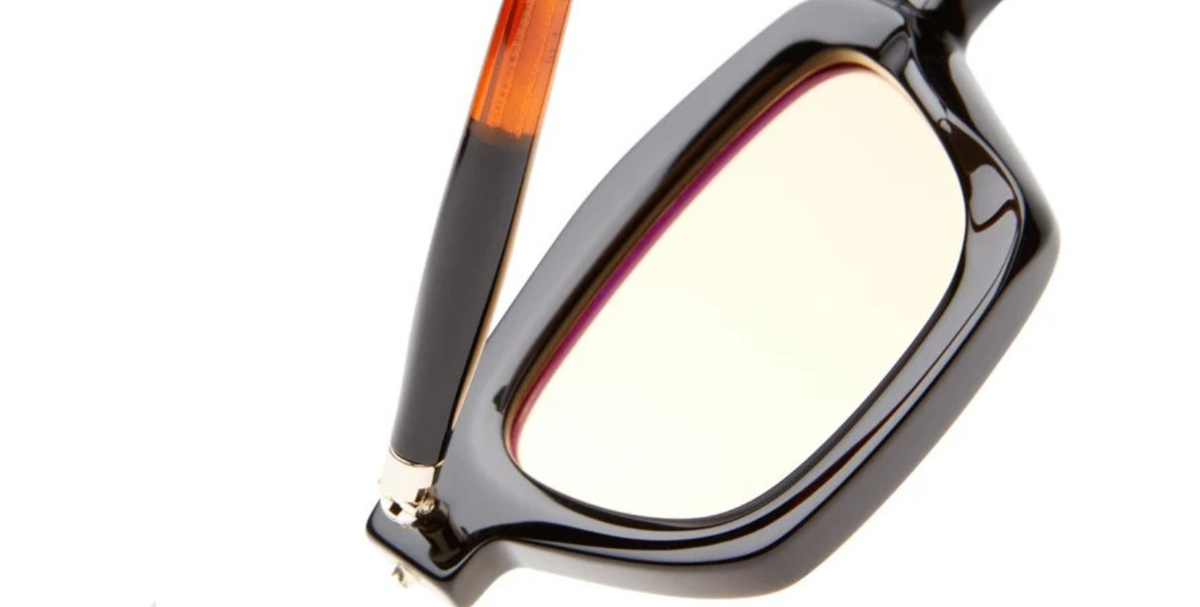 kuboraum P25 BT eckige sonnenbrille aus acetat in schwarz und braun mit hellen orangenen gläsern