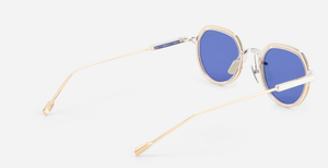 sato Belell II P/RG-1 panfoförmige sonnenbrille aus titan in silbe rund gold mit blauen gläsern