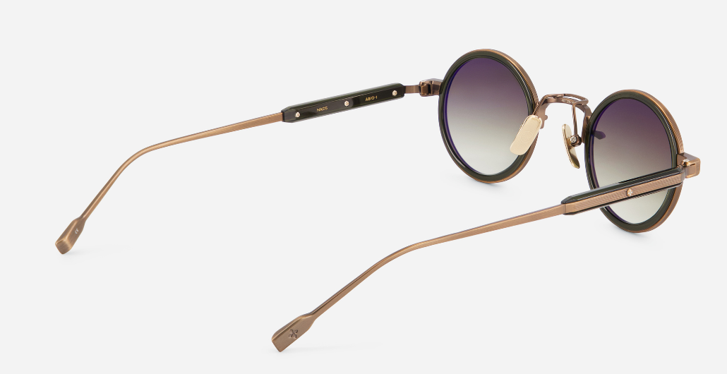 sato naos ab/o-1 ovale sonnenbrille aus titan und acetat in bronze und olive mit grün verlaufenden gläsern