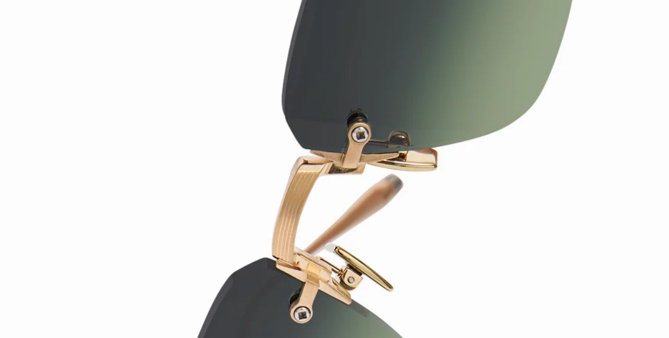 akoni juno three brushed 12k gold eckige randlose sonnenbrille in gold mit grau grünen verlaufsgläsern