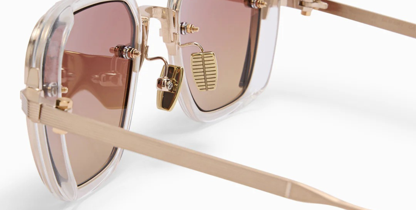 akoni jura crystal clear eckige sonnenbrille in transparent und gold mit rosa orangen verlaufsgläsern