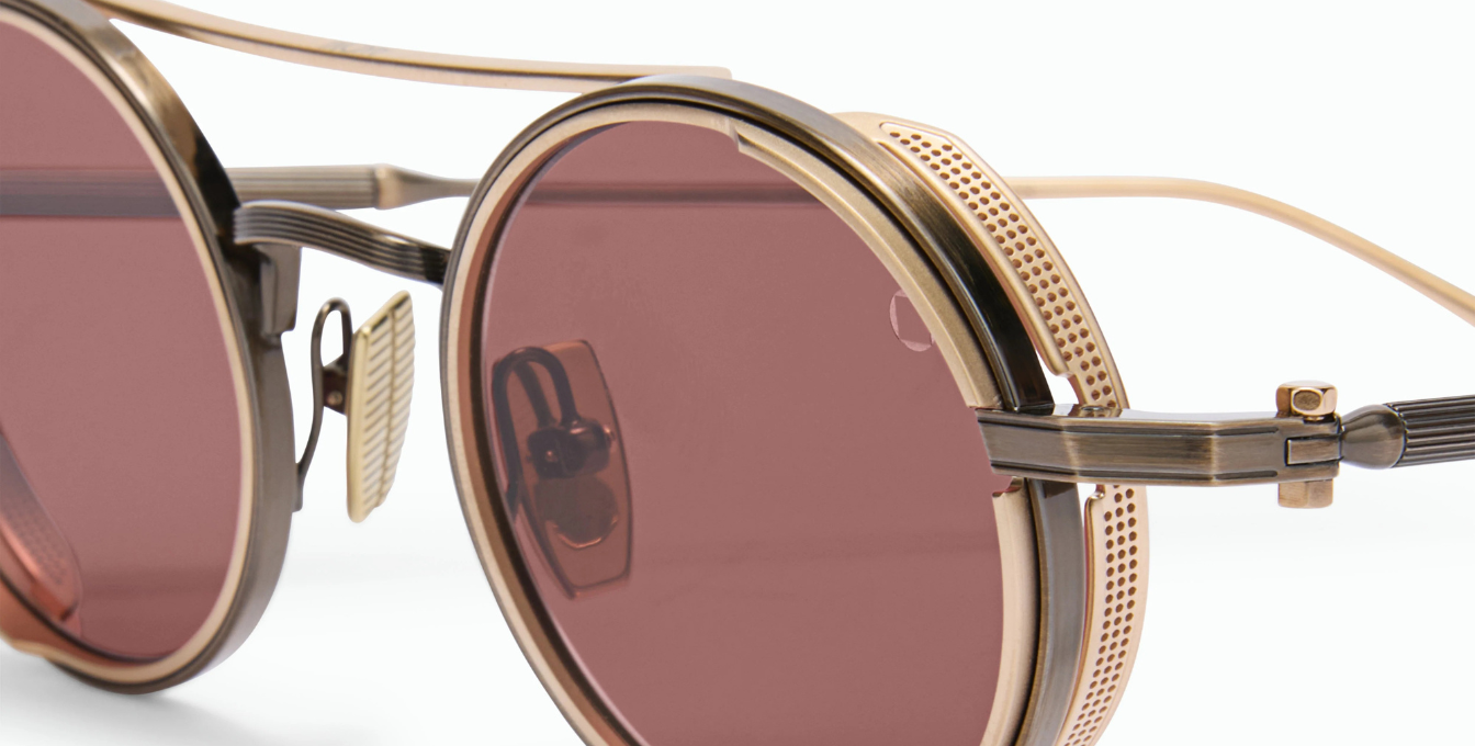 akoni eris antique gold runde aviator sonnenbrille aus titan in gold mit braunen gläsern